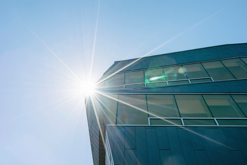 Modern glass office building in downtown Toronto, Canada, representing the corporate tech sector.